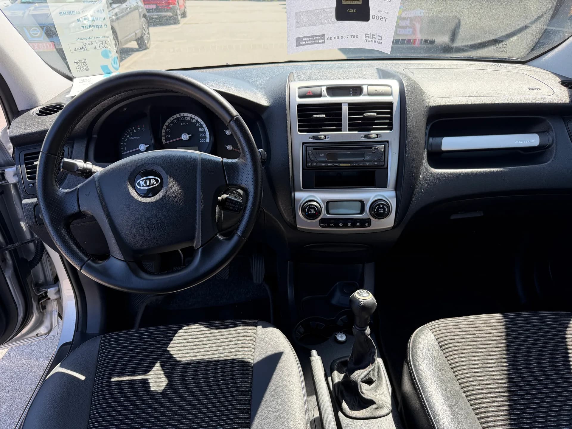 Kia Sportage — фото 7