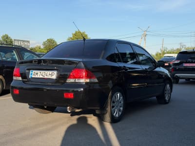 Mitsubishi Lancer — фото 3