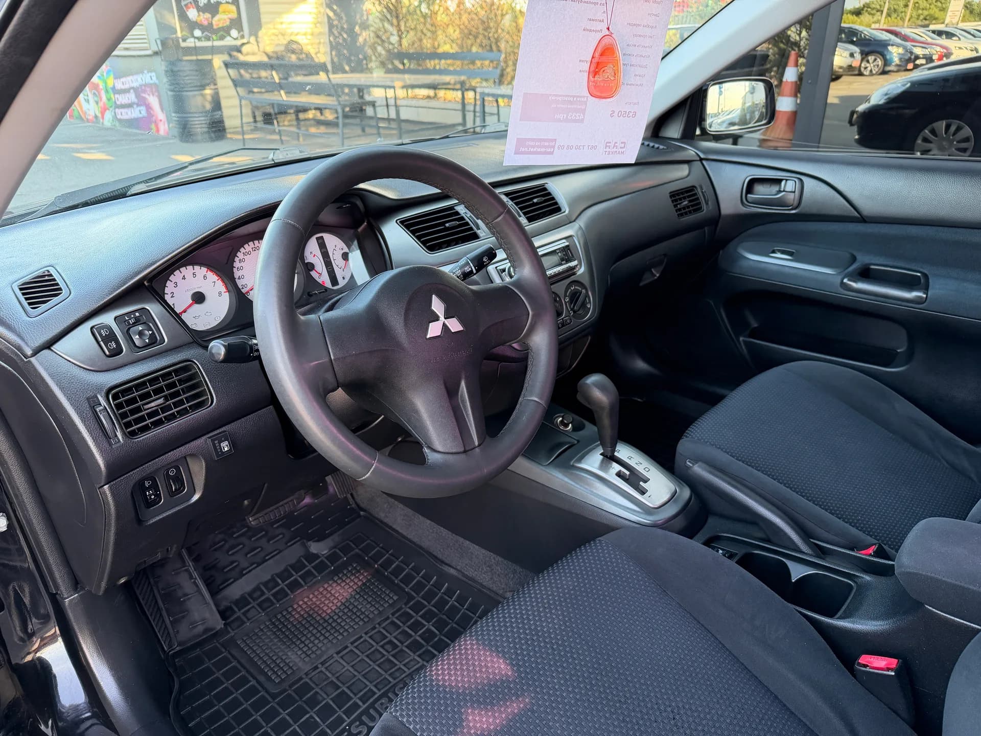Mitsubishi Lancer — фото 4