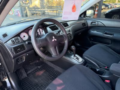 Mitsubishi Lancer — фото 4