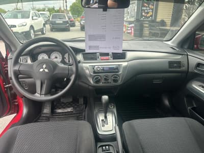 Mitsubishi Lancer — фото 11