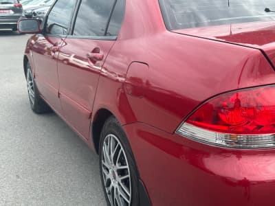 Mitsubishi Lancer — фото 14