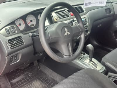 Mitsubishi Lancer — фото 6