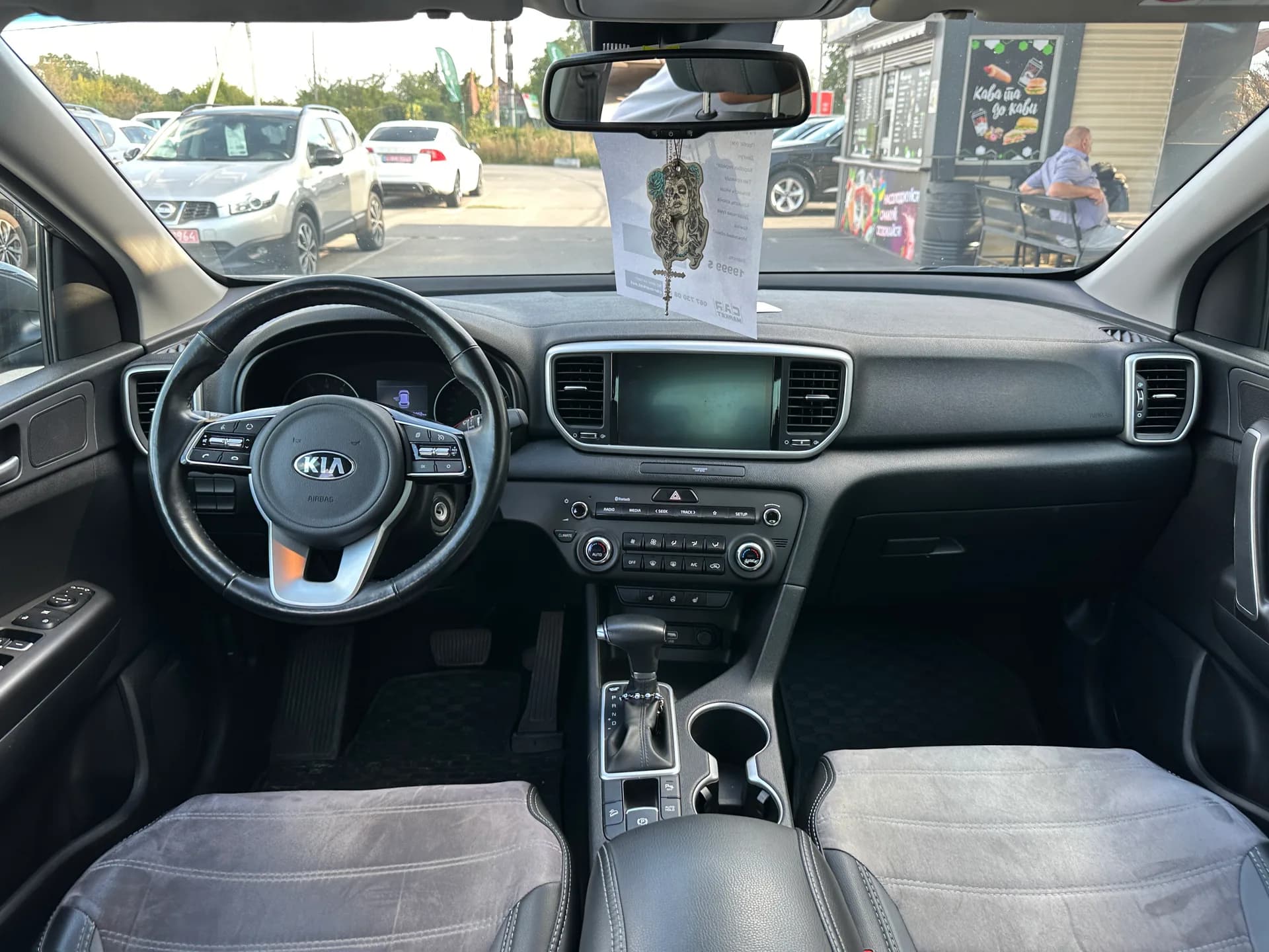 Kia Sportage — фото 7