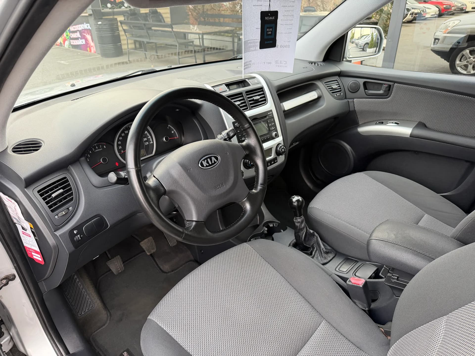 Kia Sportage — фото 5