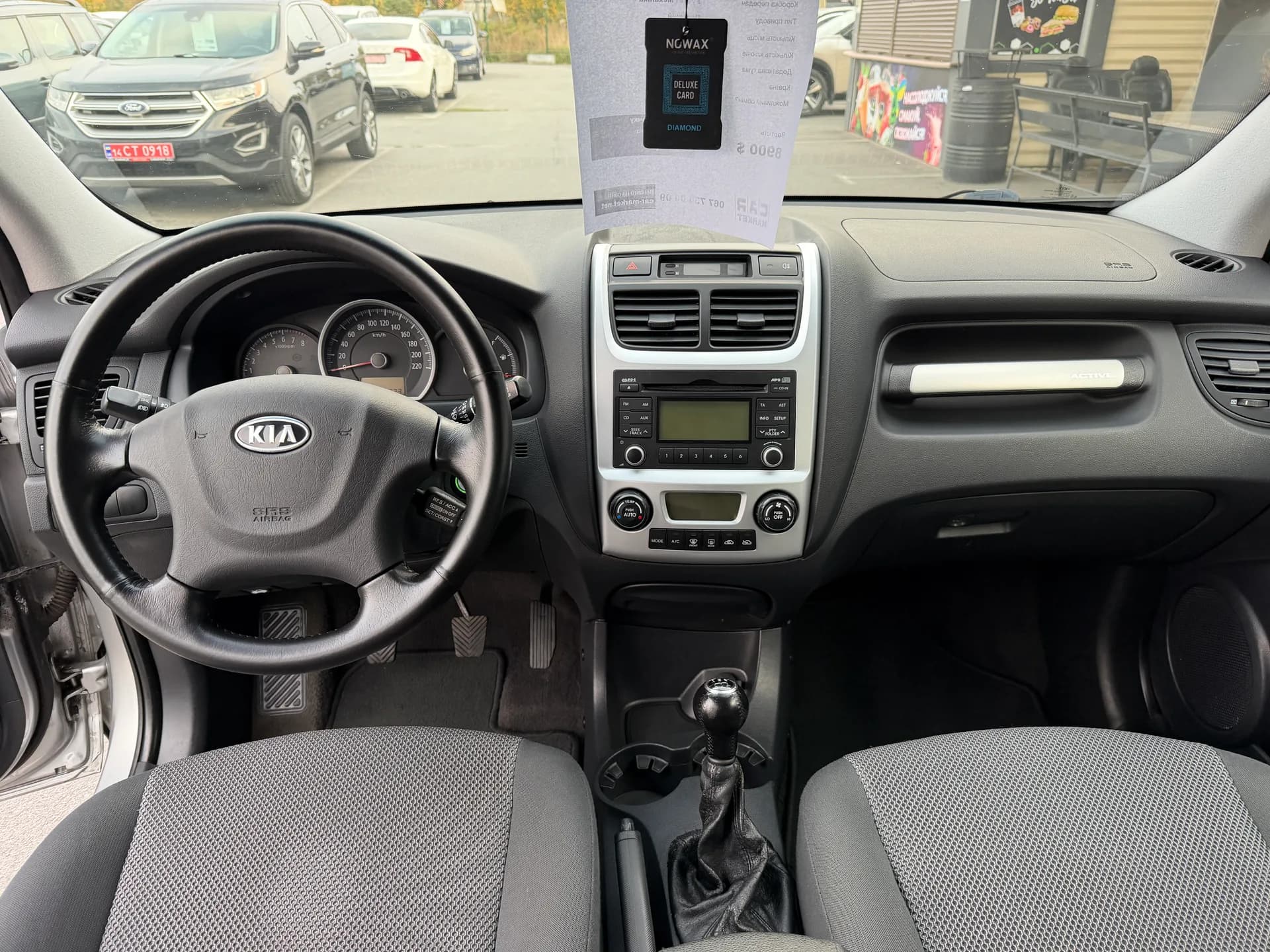Kia Sportage — фото 6