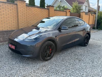 Tesla Model Y — фото 1
