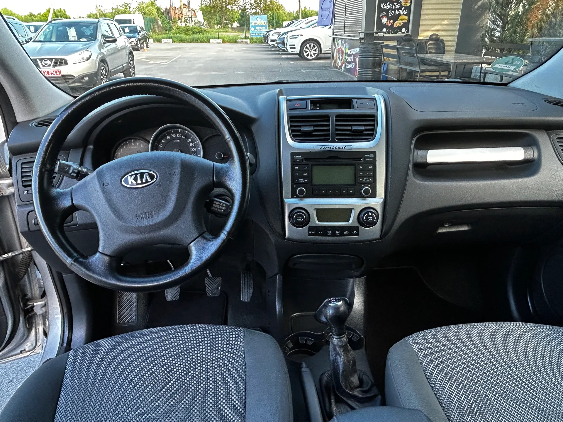 Kia Sportage — фото 6