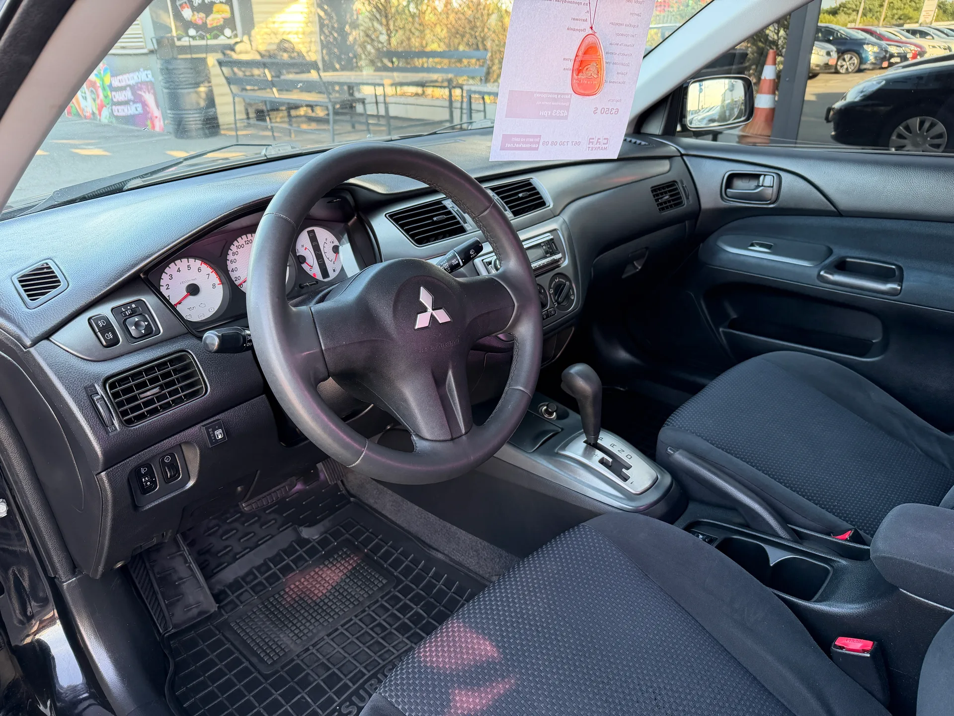 Mitsubishi Lancer — фото 4