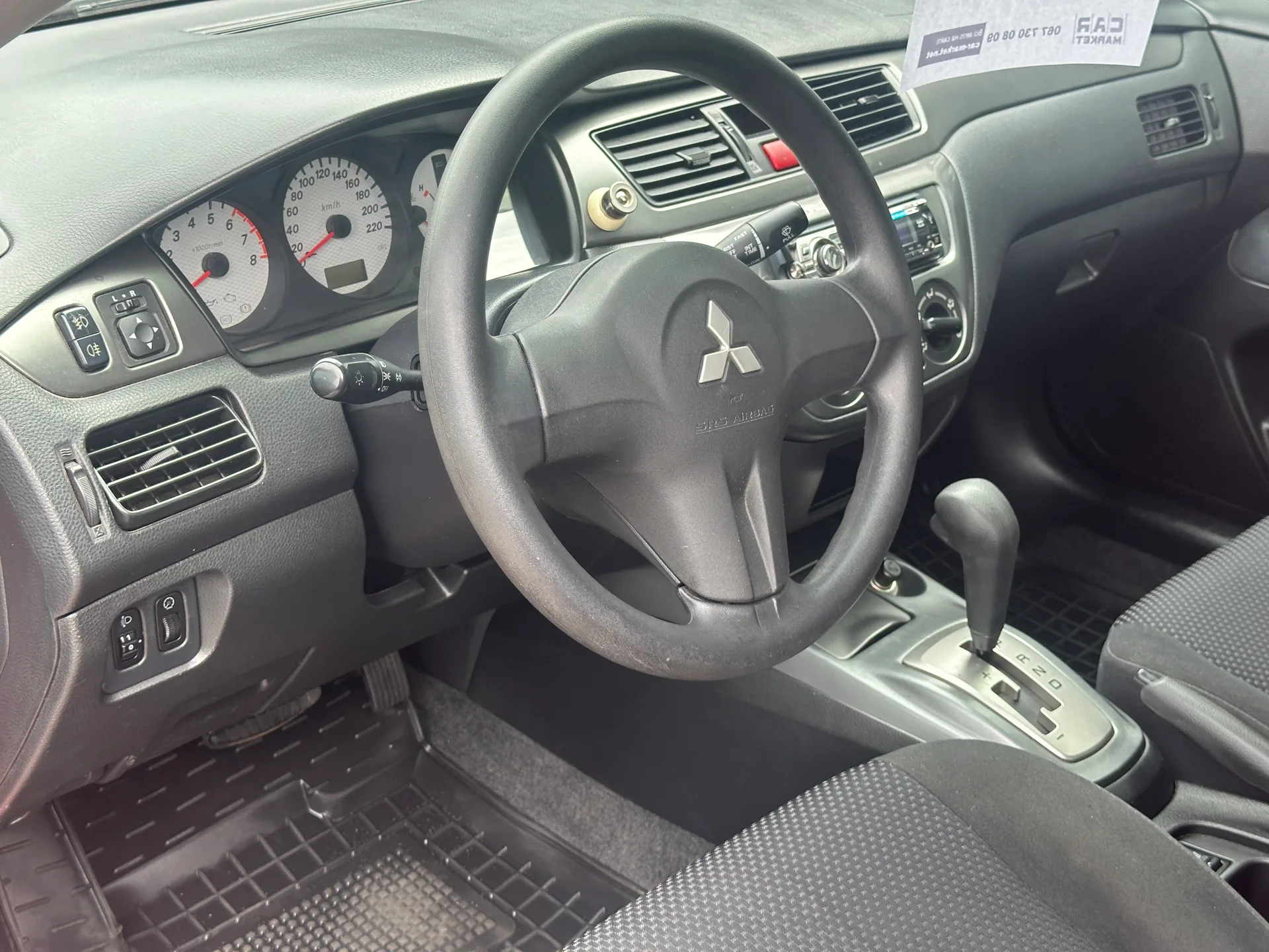 Mitsubishi Lancer — фото 6