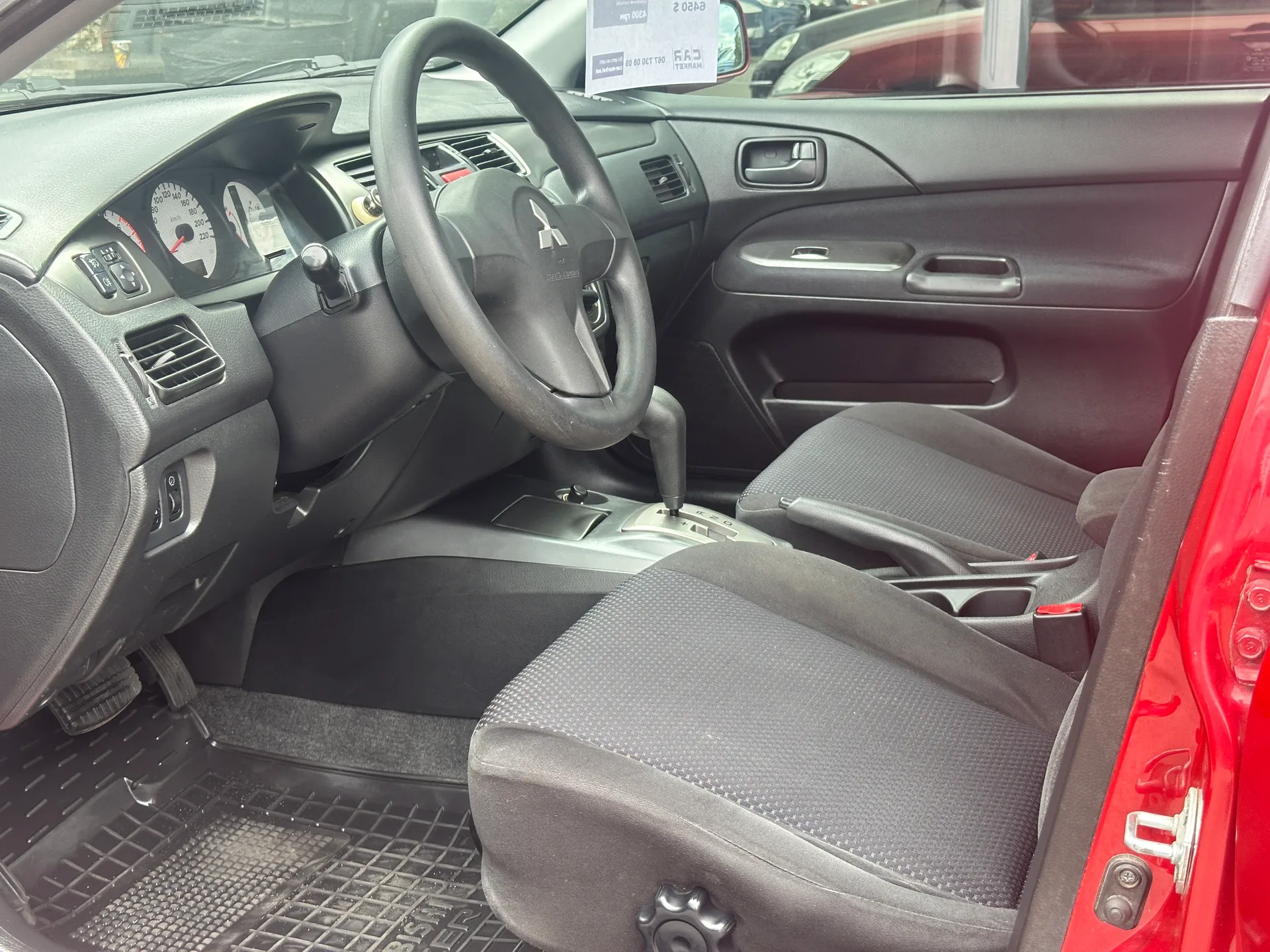 Mitsubishi Lancer — фото 7