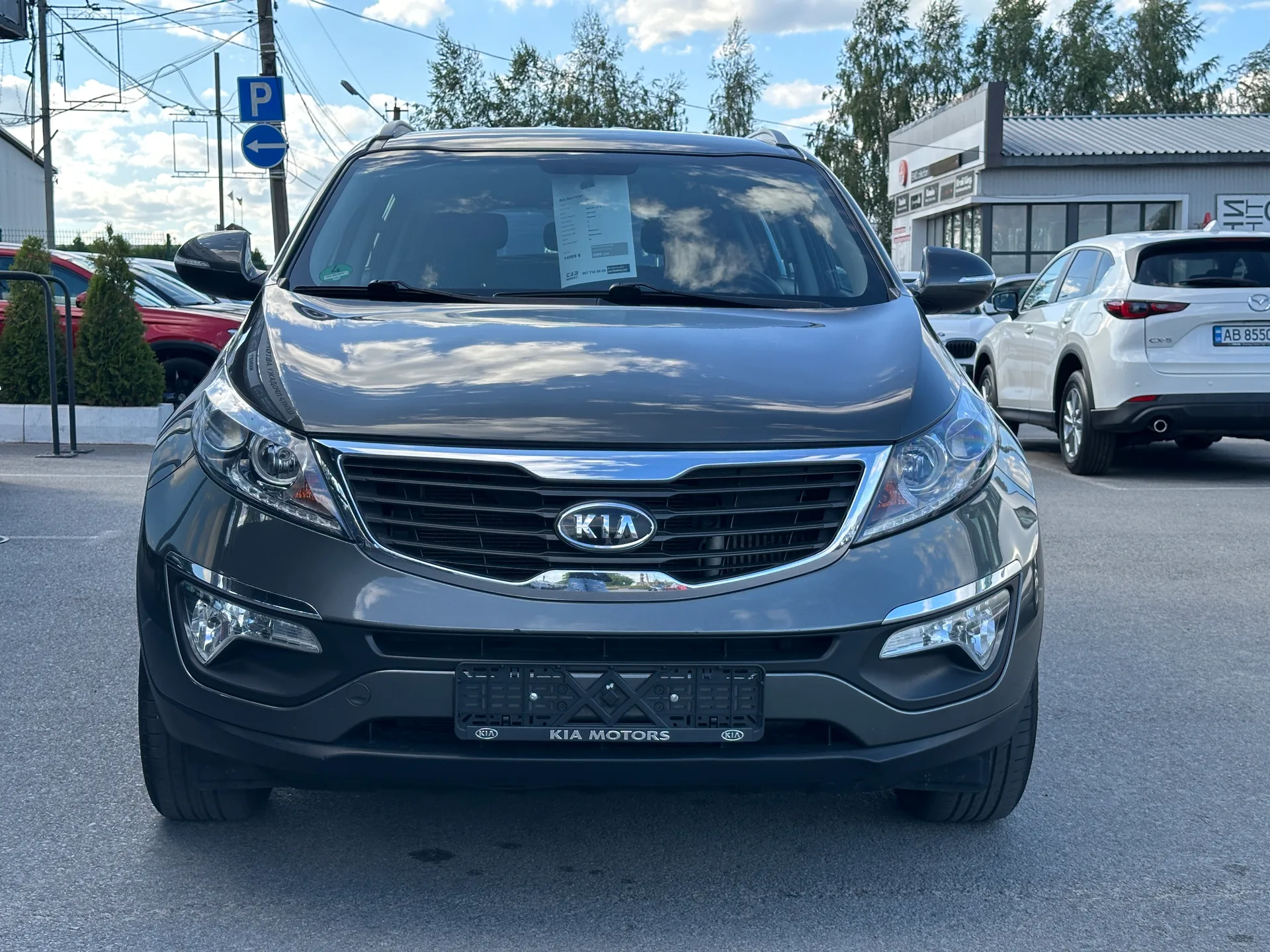 Kia Sportage — фото 12
