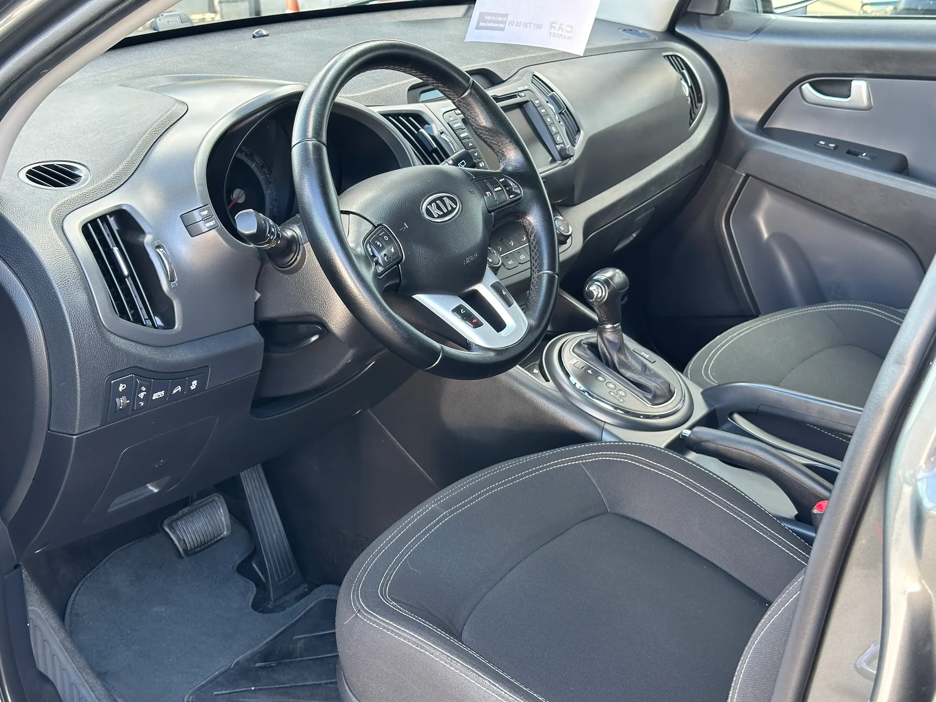 Kia Sportage — фото 5